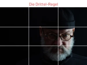 Drittel-Regel mit männlichem Protrait vor schwarzem Hintergrund